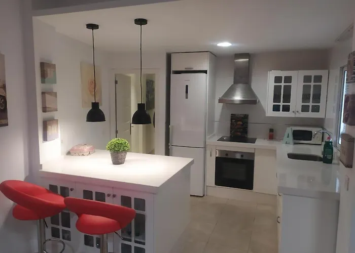 Апартаменты Patios De